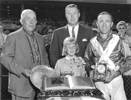 1960 Speer's Handicap presentation (L-R) Joe Johansen, Kennedy, Gene Pederson and Scotty's daughter Joan in front.