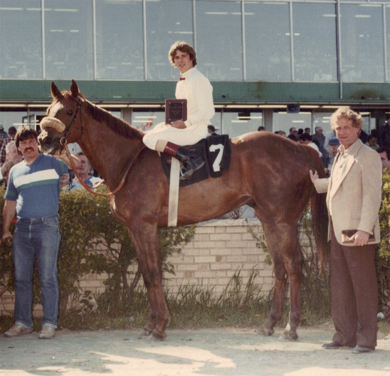 Mike wins Polo Park Handicap aboard Rockcliffe. May 27, 1984. Win #500 for trainer Don Gray.