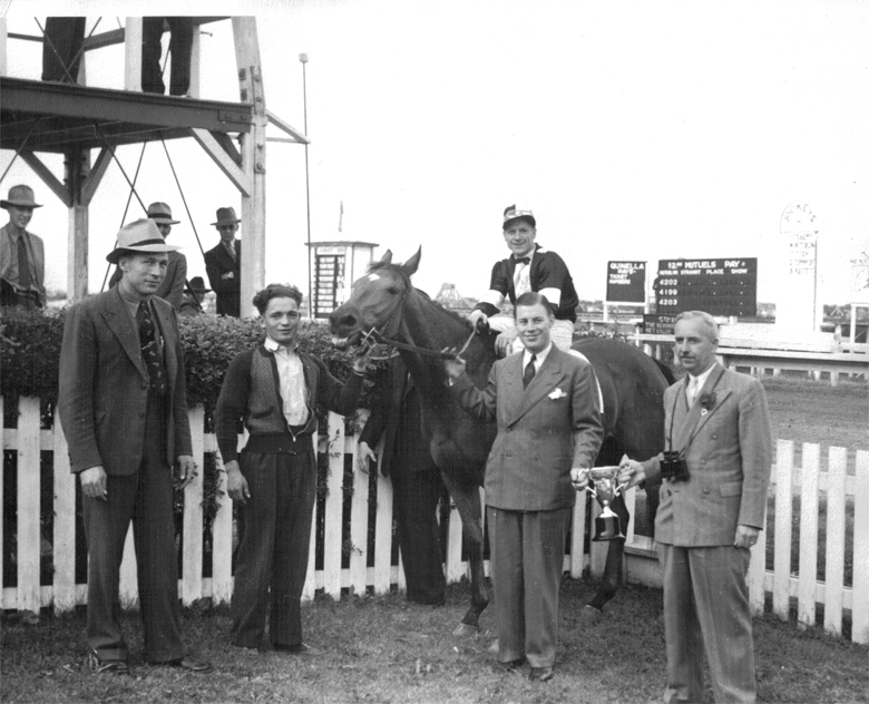 The 37-cent horse, Omar's Gift at Polo Park. "Duke" Campbell on the far left.