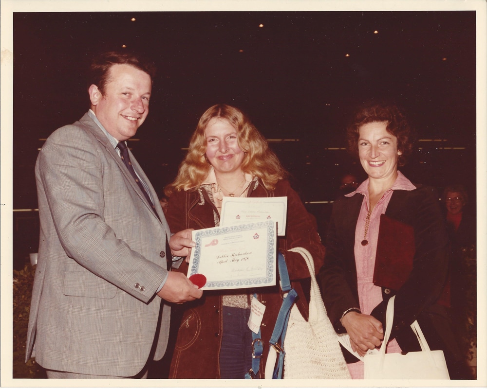 Debbie Richardson receives Trainer Award, April-May 1978, with proud Mom Betty looking on.