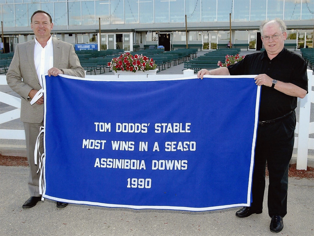 ASD CEO Darren Dunn (left) and Track Historian Bob Gates recognize trainer Tom Dodds' record 78 wins in a season in 1990. A record that still stands.