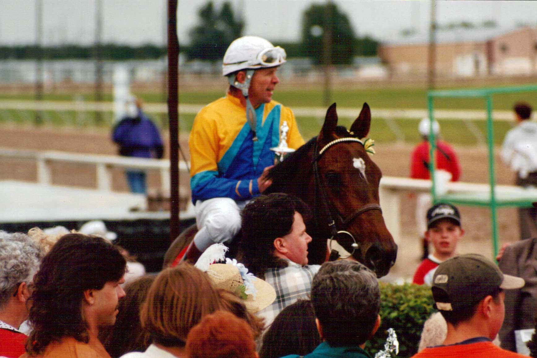 Royal Frolic with Larry Bird up after winning the 45th running of the Manitoba Derby. August 2, 1993.