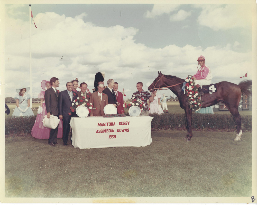 Fire n Desire. 1969 Manitoba Derby. In the special infield winner's circle. Note the Silver Derby Trays.